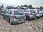 Toyota Yaris II mcperson prawy 1,0 1,3 zwrotnica - 10