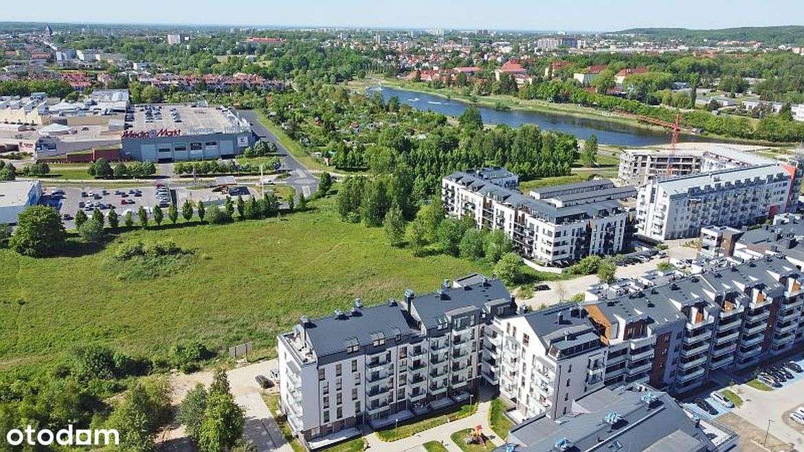 Nowy budynek. 76m2 mieszkania + 20m2 tarasu +4m2 komórka + m-ce post. - Pełny obrazek: 2/18