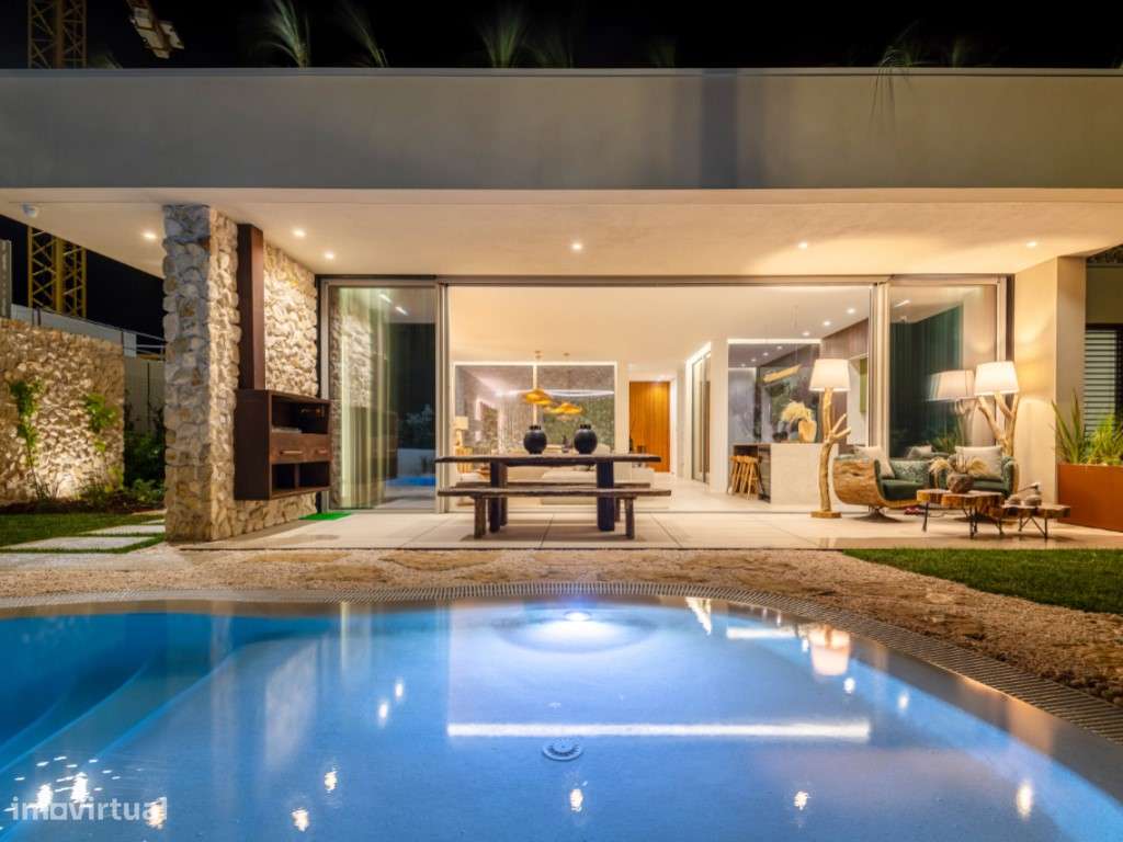 Moradia de extraordinária qualidade junto à lagoa, golfe e praia-2