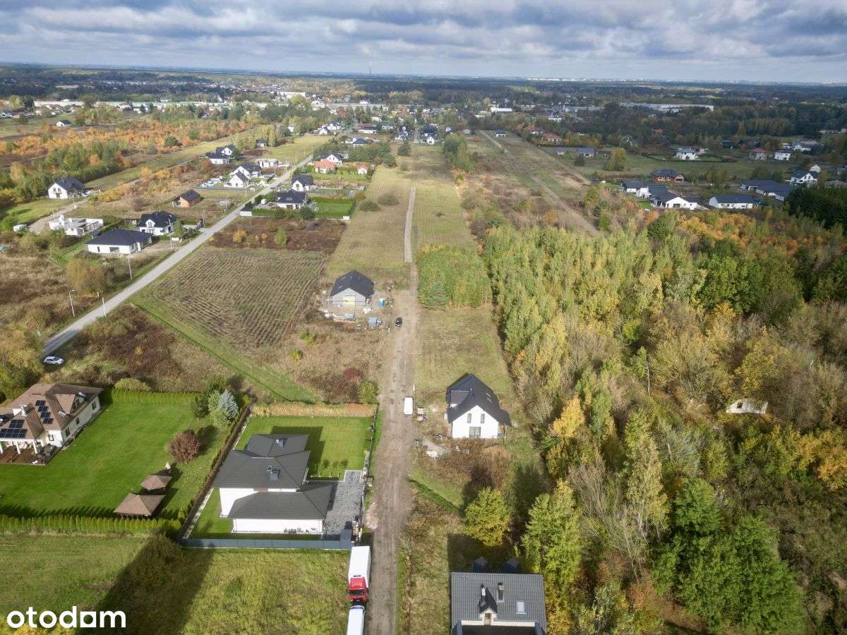 Działka otoczona zielenią, z mediami w Ruścu-3