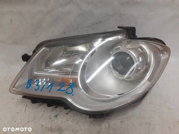 .  PRZOD PRZEDNIA LAMPA LEWA VOLKSWAGEN TOURAN - 1