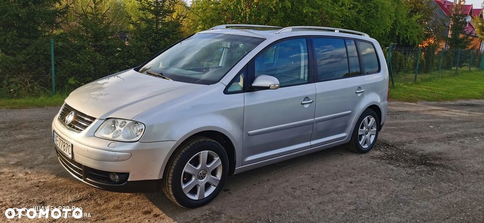 Volkswagen Touran 2.0 FSI Highline - 1