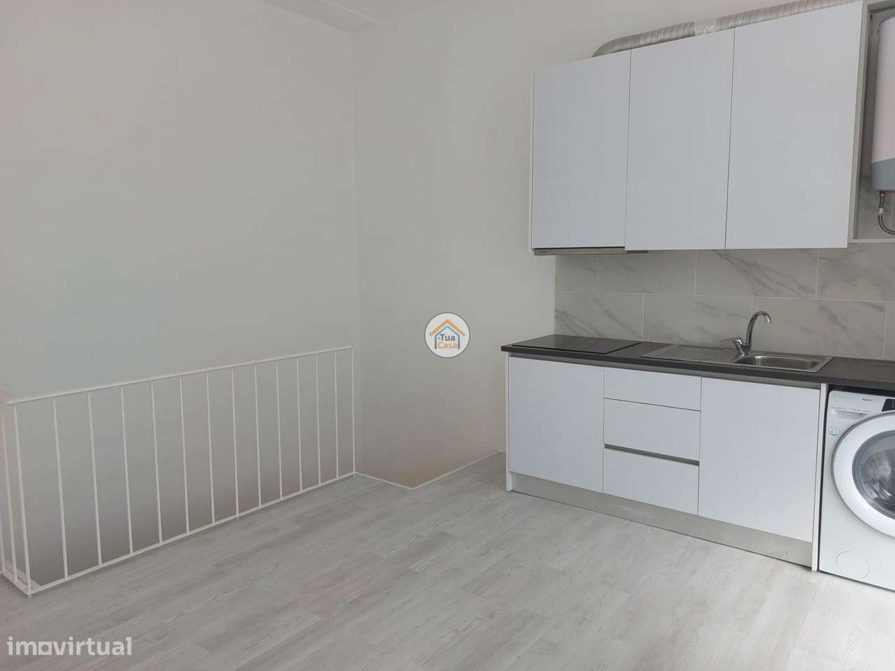 Loja transformada em excelente T3 - Grande imagem: 4/22