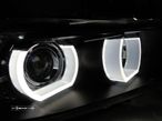 Farois de XENON Angel Eyes 3D Tipo U BMW E90 / E91 05-08 Fundo Preto - 1