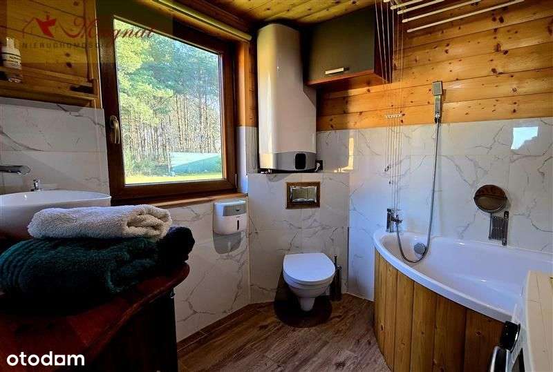 Atrakcyjny dom drewniany całoroczny na dużej dział-19