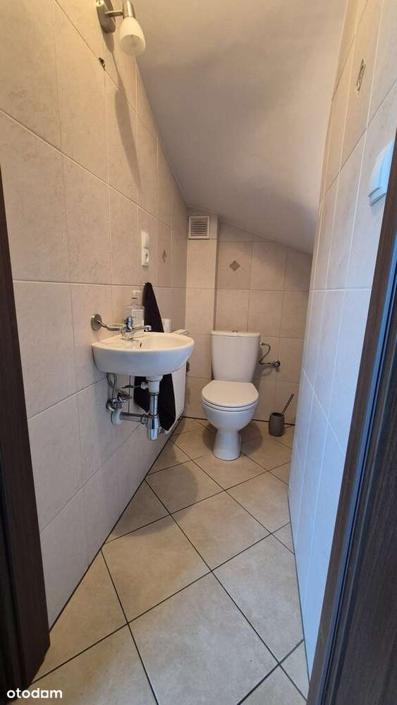 dwupoziomowe z ogródkiem i garażem na Plewiskach-4