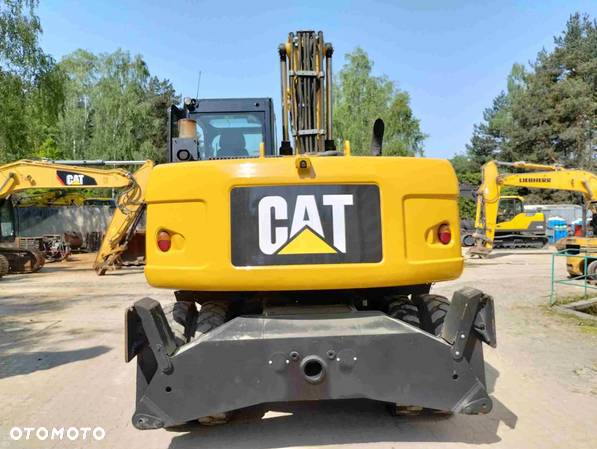 Caterpillar M313D - 5