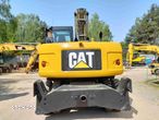 Caterpillar M313D - 5