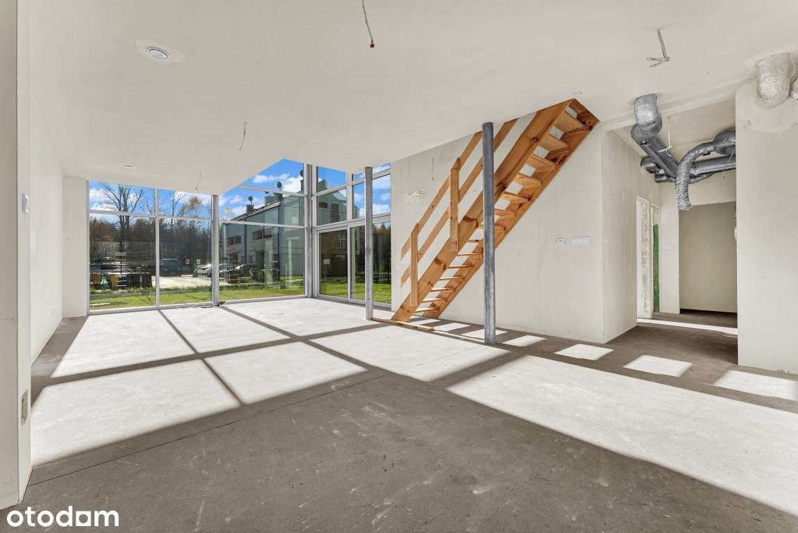 Dwupoziomowy apartament z panoramicznymi oknami, ogródkiem i garażem - Pełny obrazek: 5/14