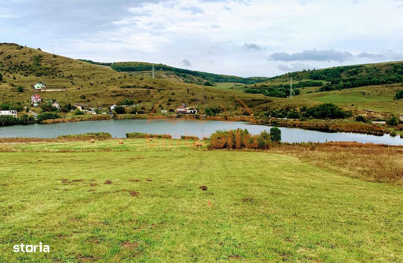 Teren de vanzare langa lacul Chinteni Intravilan 9.959m²40€ m² - Imagine principală: 4/5