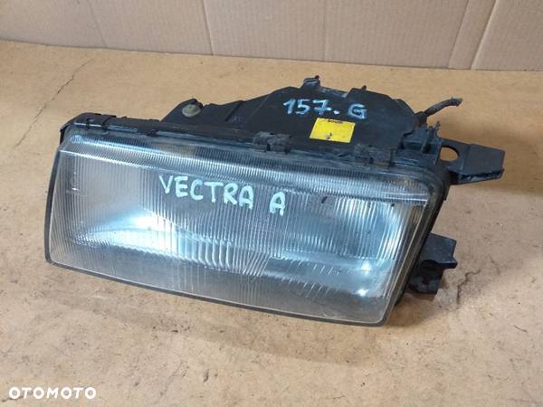 157G OPEL VECTRA A Reflektor Lampa przednia lewa Oryginał Wersja Europejska - 2