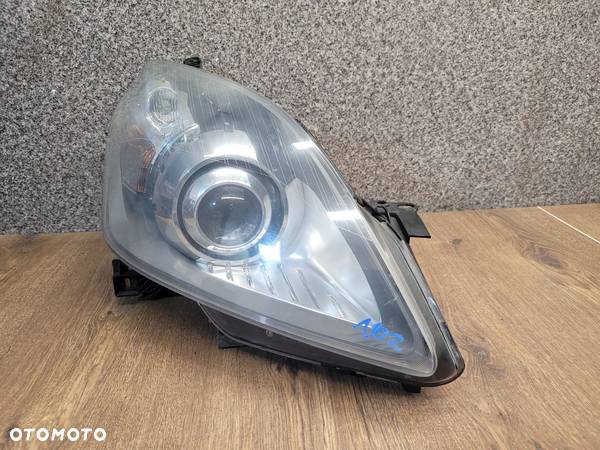 OPEL ZAFIRA B LAMPA PRAWY PRAWA PRZÓD PRZEDNIA XENON 0301214682 - 4