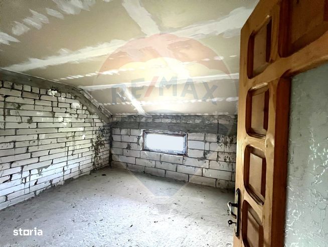 Casă / Vilă cu 6 camere de vânzare în BUHUȘI Județul BACĂU-10