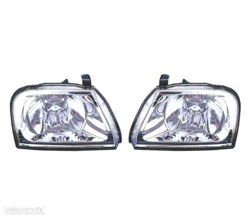 FARÓIS OPTICAS COM REGULAÇÃO MANUAL PARA MITSUBISHI L200 K74 96-06 - 1