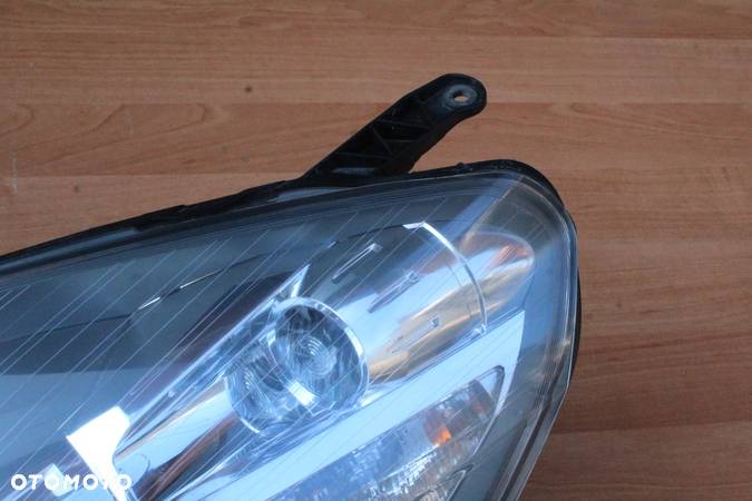 LAMPA LEWY PRZÓD BI-XENON OPEL ZAFIRA B EUROPA BARDZO ŁADNA 0301214283 - 8