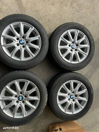 vând set jante originale pe 17” BMW X3 cu anvelope - 1