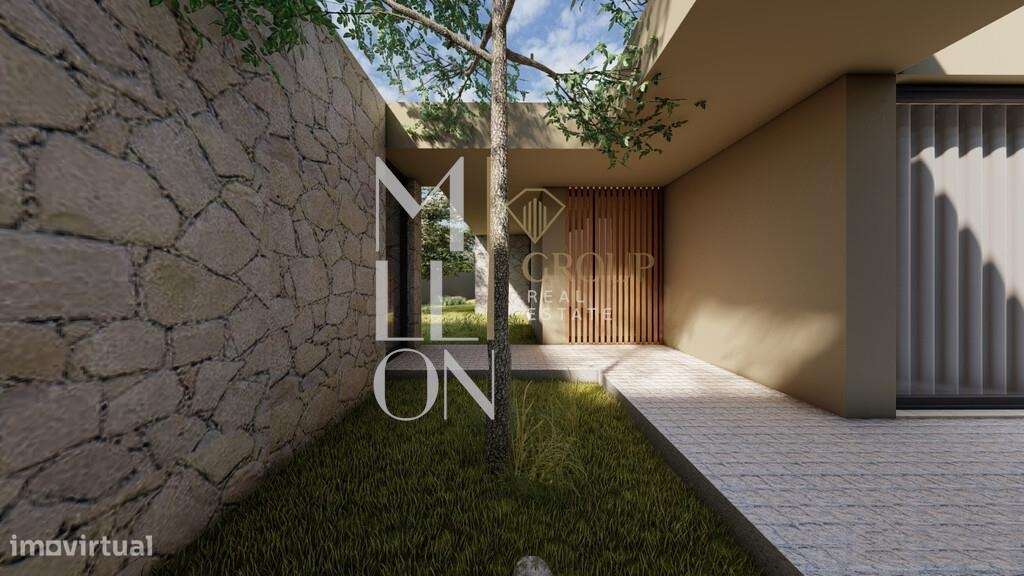 Moradia Moderna com Piscina em Zona Residencial Tranquila – Vila Praia-6