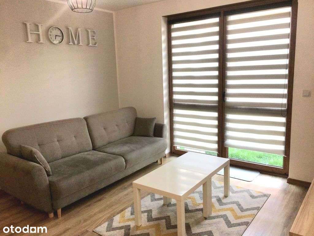 Dwupokojowe mieszkanie z ogródkiem i garażem-1