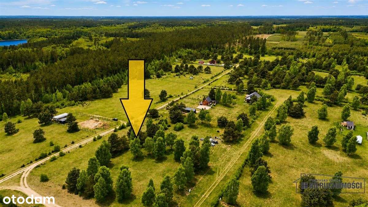 Działka budowlana nad pięknym jeziorem Dołgie.-8