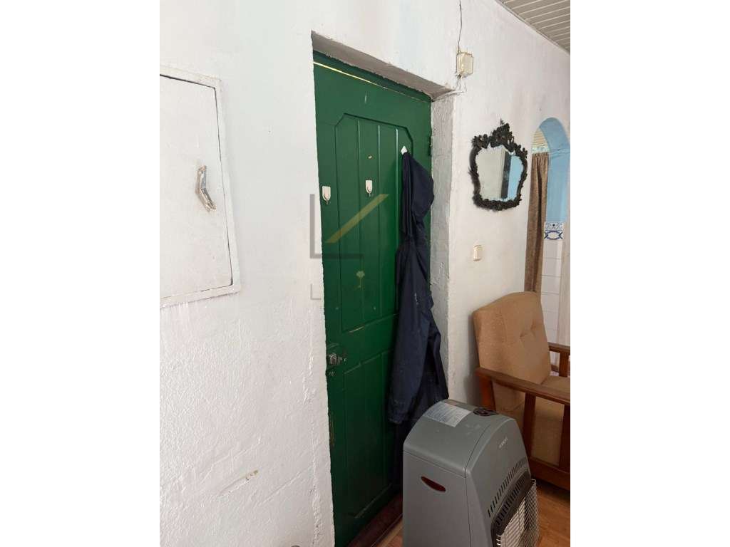 Terreno Urbano com 412m2 e pequena moradia edificada-23