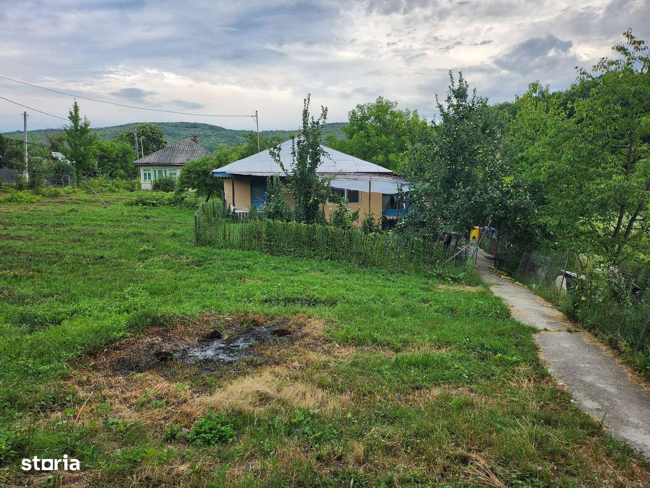 Casa cu teren langa padure la Buhoci - Imagine principală: 1/12