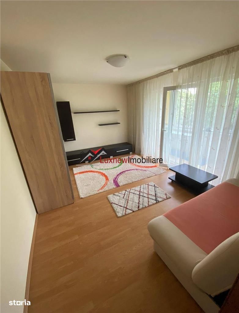 Apartament cu 4 camere, 2 bai, balcon etaj intermediar situat in Manas