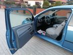 Ford Fiesta 1.4 Ghia - 12
