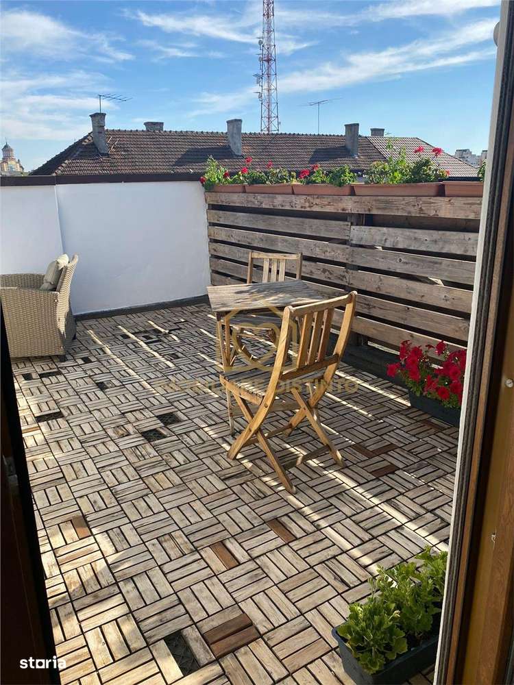 Apartament cu doua camere si terasa zona centrala - Imagine principală: 3/12