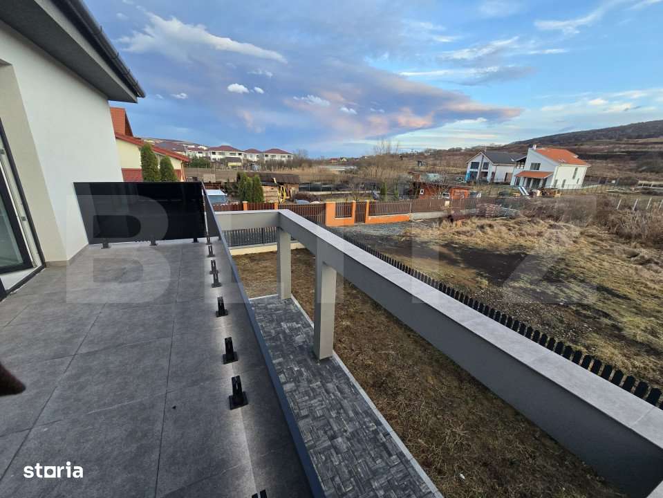 Casa individuala moderna, cu garaj, la intrare in Chinteni - Imagine principală: 2/12