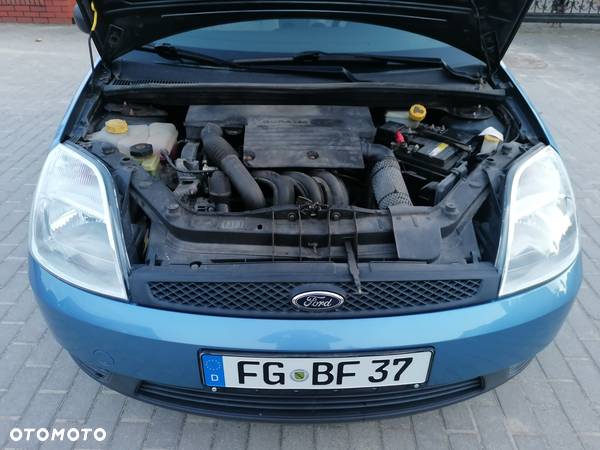 Ford Fiesta 1.4 Ghia - 26