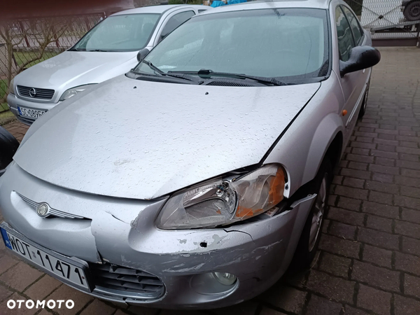 Chrysler Sebring 2 II antena elektryczna 04760894AB samochód auto na części ps2 - 11