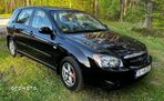 Kia Cerato 1.6 (klm) / Comfort - 10