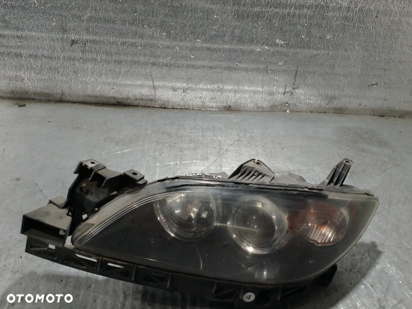 LAMPA LEWA PRZÓD MAZDA 3 - 7