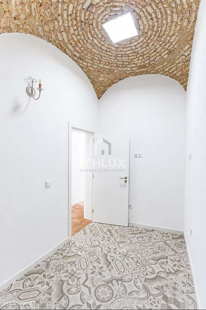 Moradia T1 renovada com açoteia na Baixa Histórica de Olhão-7