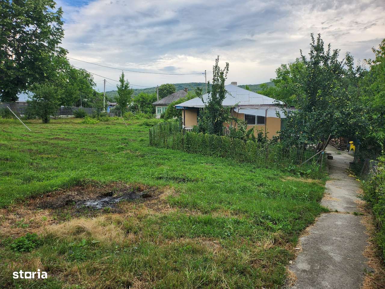 Casa cu teren langa padure la Buhoci - Imagine principală: 5/12