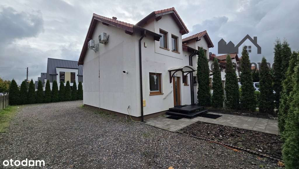 Skrajny dom w zabudowie szeregowej-Mosina-0