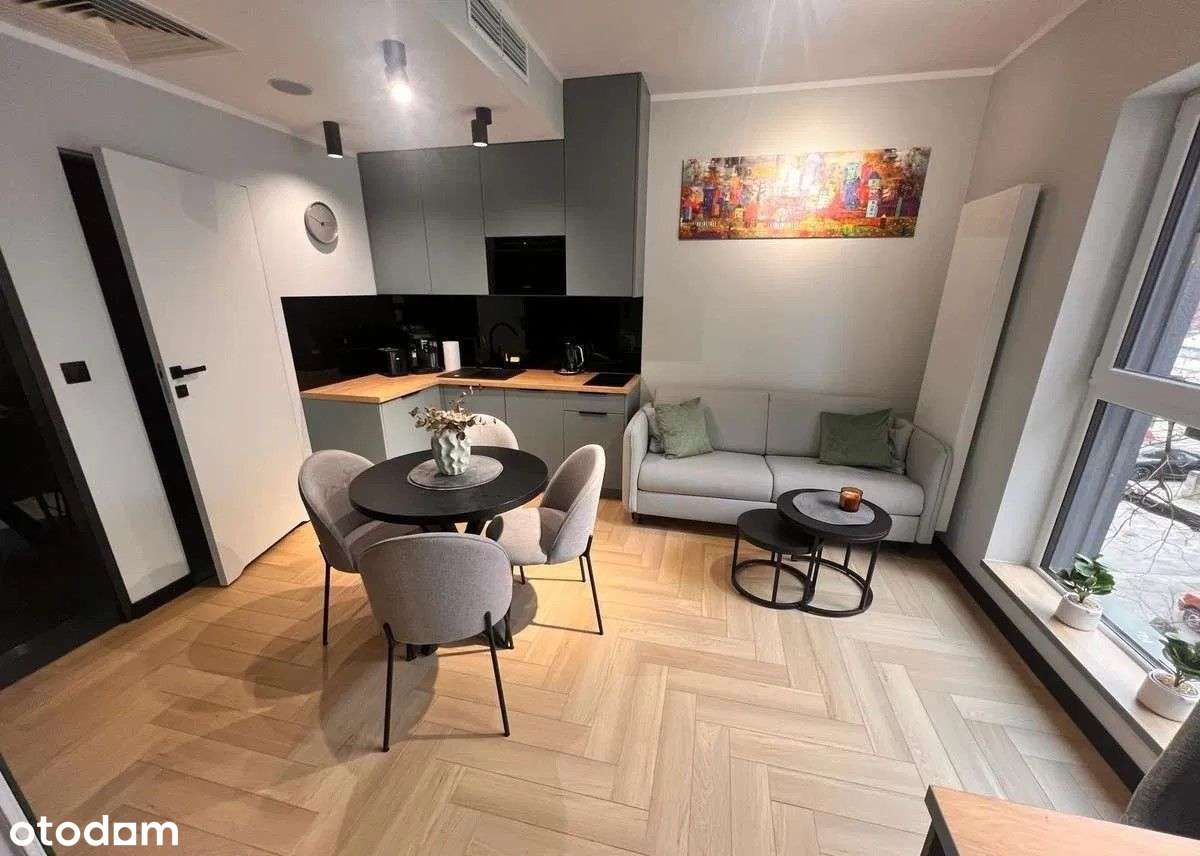 Plac Wolności, 2 pokoje w nowoczesnym budynku