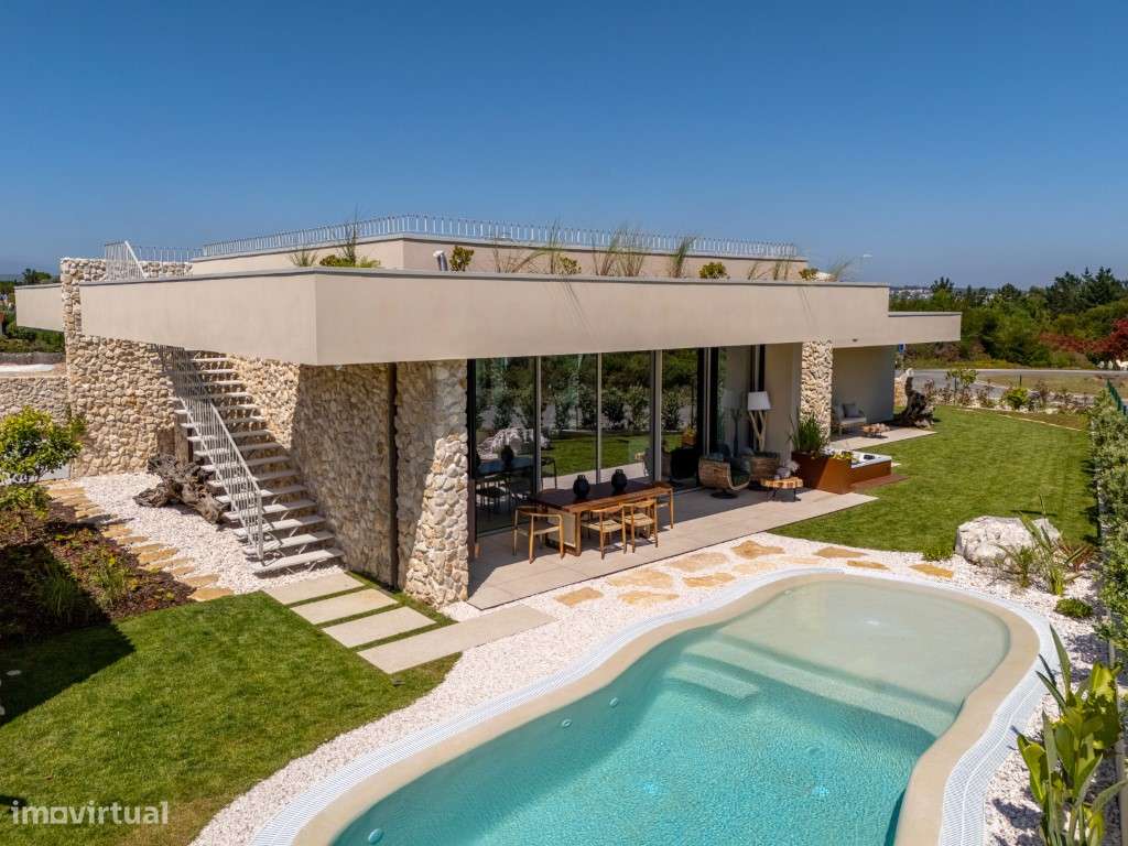 Moradia de extraordinária qualidade junto à lagoa, golfe e praia-39