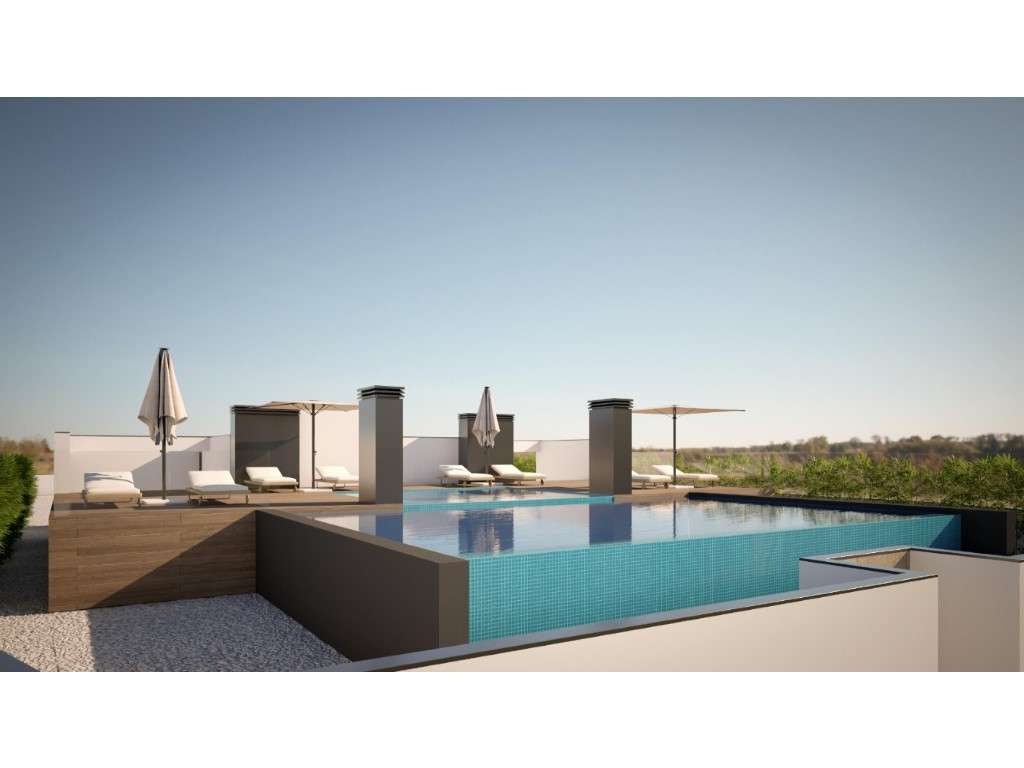 Apartamento T1 novo, varanda com churrasqueira; piscina e playgroun... - Grande imagem: 2/17