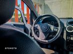 Opel Corsa 1.2 16V Enjoy - 8