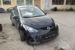 Dezmembrez Mazda 2 an 2010 motor 1.3 benzina 77.000km usi cutie stop - 2