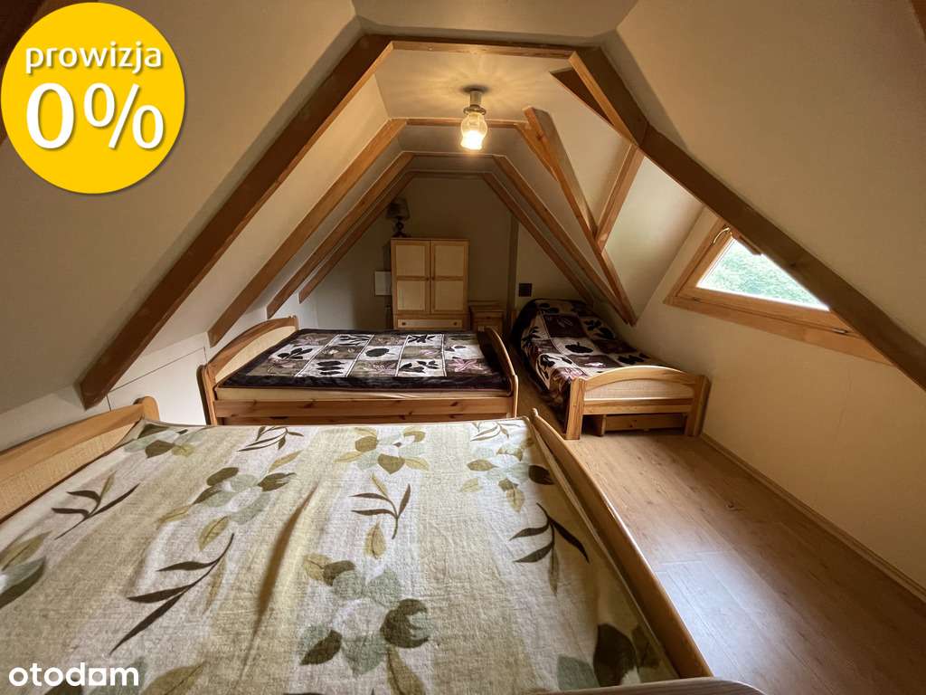 Podwójny dom z bala w enklawie ciszy i zieleni.-16