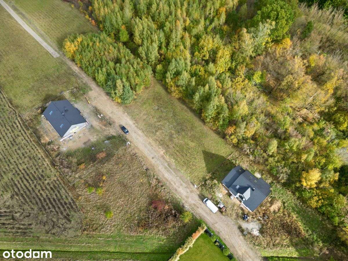 Działka otoczona zielenią, z mediami w Ruścu-1