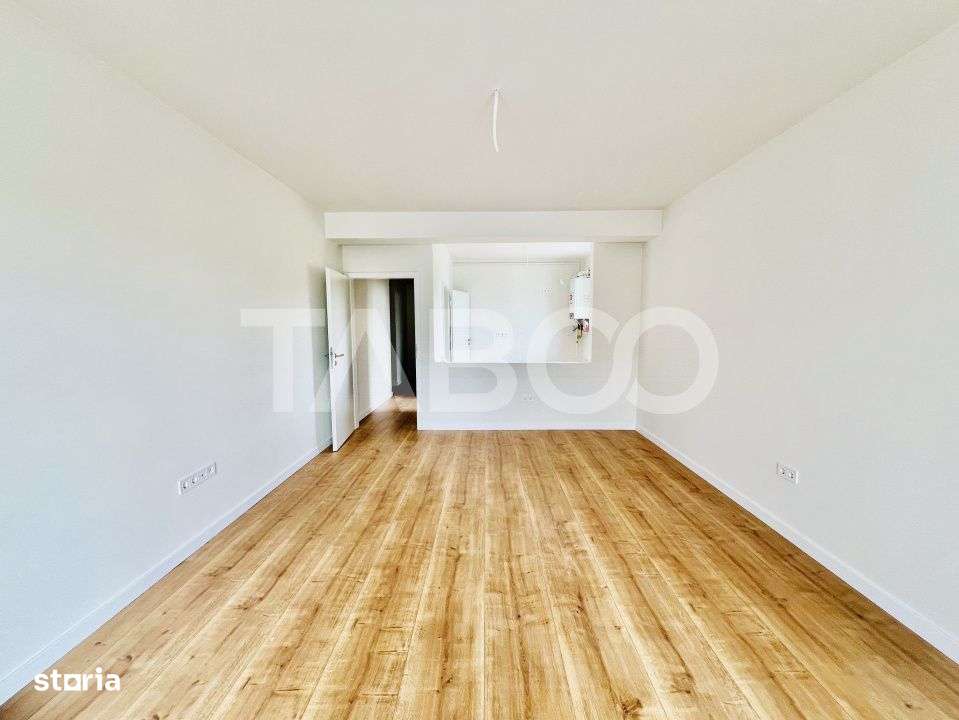 Apartament spatios cu 2 camere balcon si incalzire in pardosea - Imagine principală: 4/13