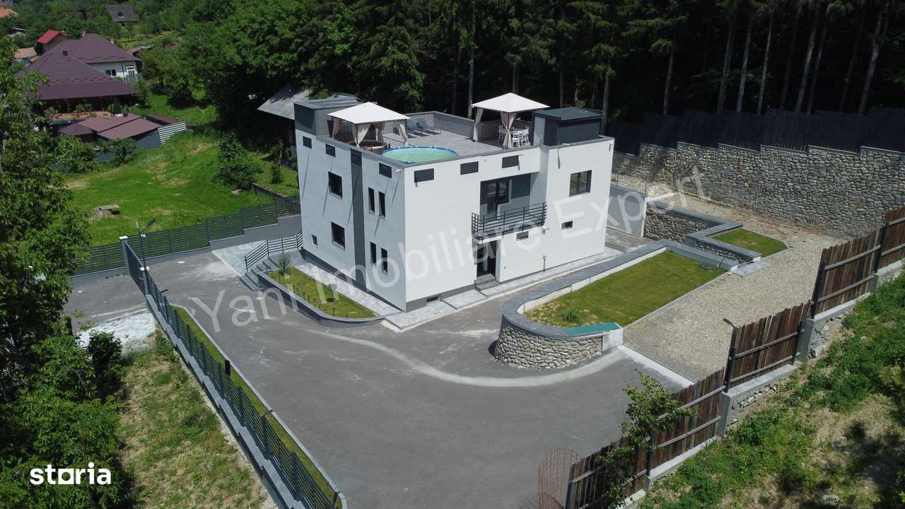 Casă de vânzare în Curtea de Argeș. - Imagine principală: 2/20