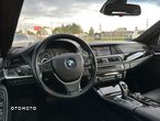 BMW Seria 5 550i - 11