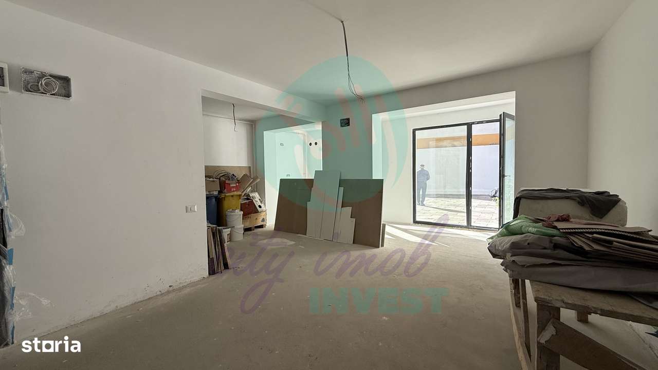 Apartament cu o curte generoasa de 60 mp - Imagine principală: 4/11