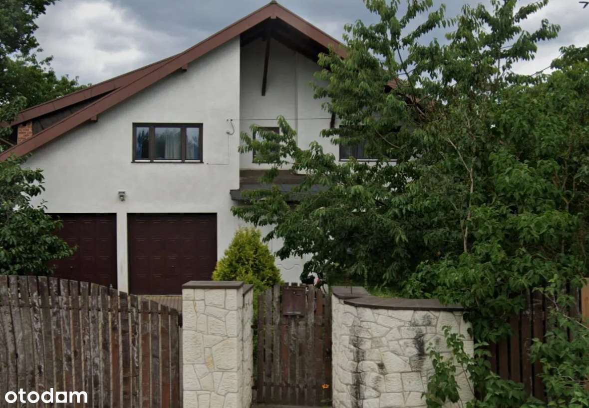 Dom jednorodzinny z garażem- LICYTACJA UDZIAŁ 1/2-0