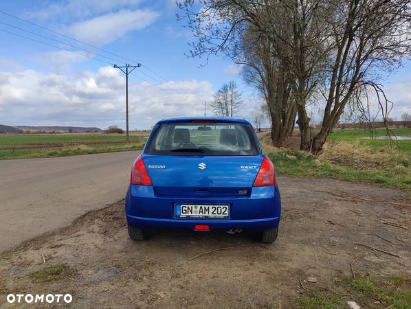 Suzuki Swift 1.3 Club - 4