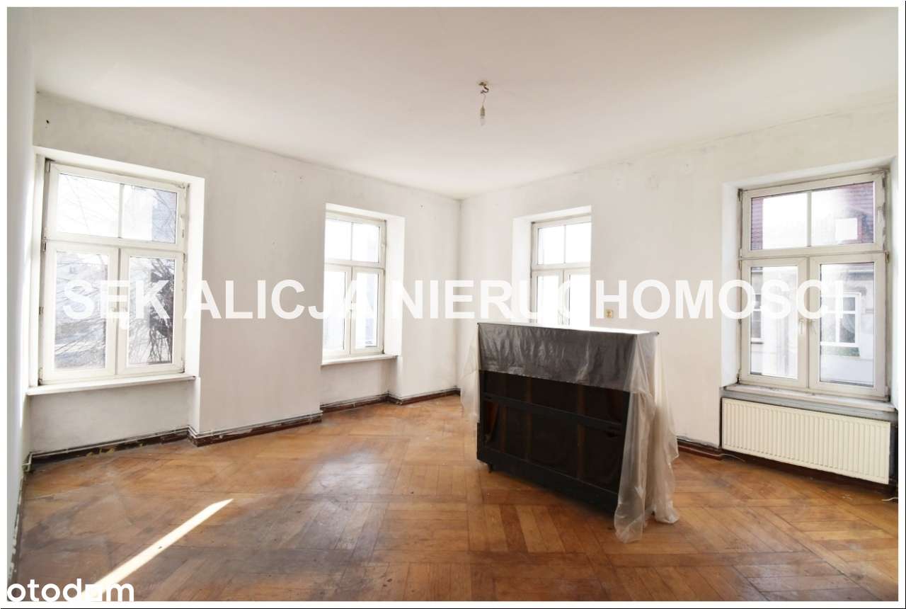 Przestronne mieszkanie z dużym potencjałem w centrum-1